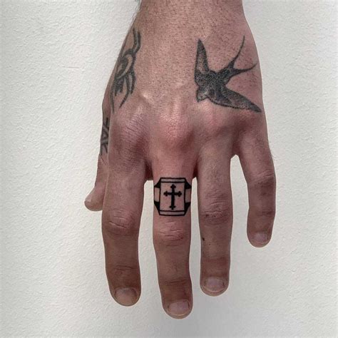 Cross ring by @ylitenzo - Tattoogrid.net