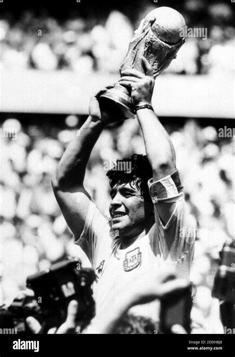 File photo dated 29-06-1986 of Diego Maradona holds up the World Cup ...