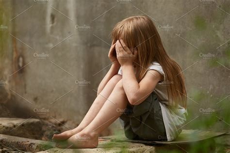 Portrait of crying girl orphan with | High-Quality People Images ...