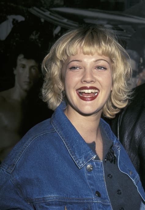 As She Turns 50, Look Back At Drew Barrymore’s Best Beauty Looks To