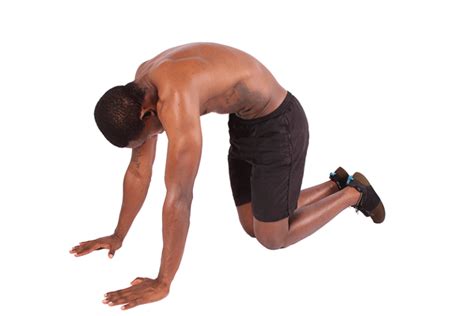 Young Man Doing Yoga Stretch For Back Pain