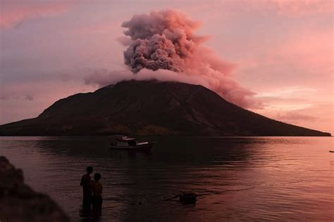 remote indonesia volcano erupts   thousands evacuated