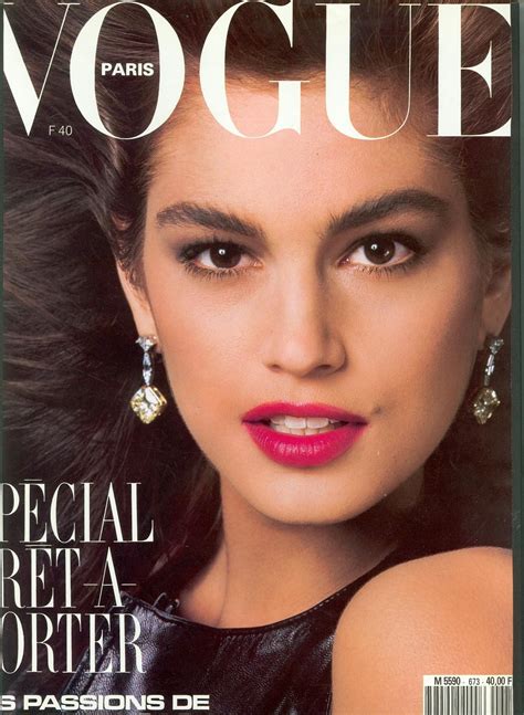 a magazine cover with a woman wearing red lipstick and earrings on her ...