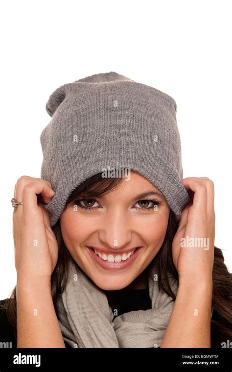 woman pulling  wooly hat    head stock photo alamy