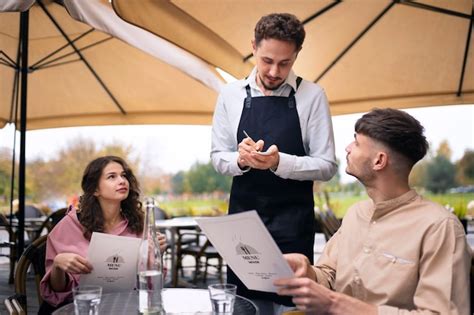 Free Photo | Friends at restaurant medium shot
