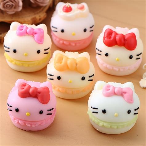 Premium AI Image | there are a lot of hello kitty macarons on the table ...