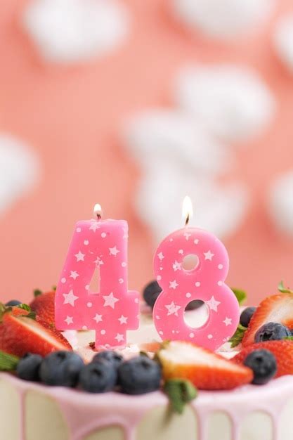 Premium Photo | Birthday cake number 48 beautiful pink candle in cake ...