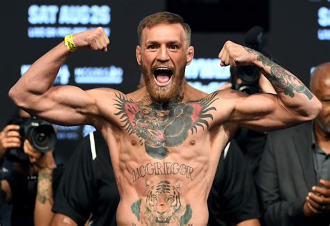 Conor McGregor doing the same pose at 145lbs and 170lbs shows physique