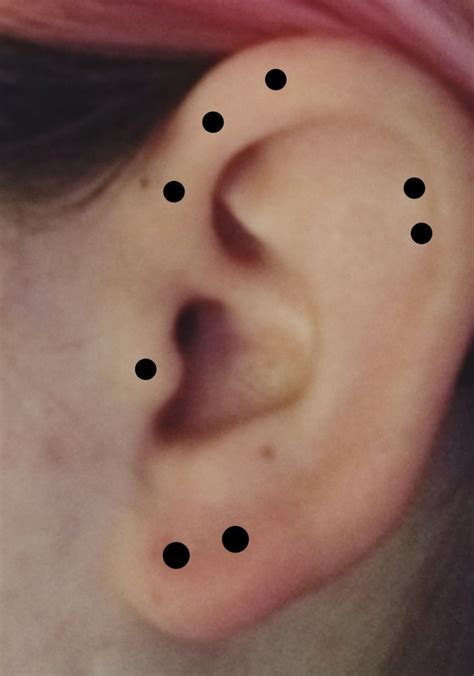 Left ear. Triple forward helix (?), Double helix, tragus, double lobe ...