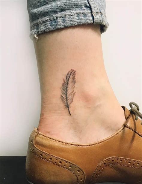 Small Feather Tattoo by Gabby Colledge - Tattoo Insider