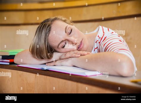 Female student sleeping in class Stock Photo - Alamy