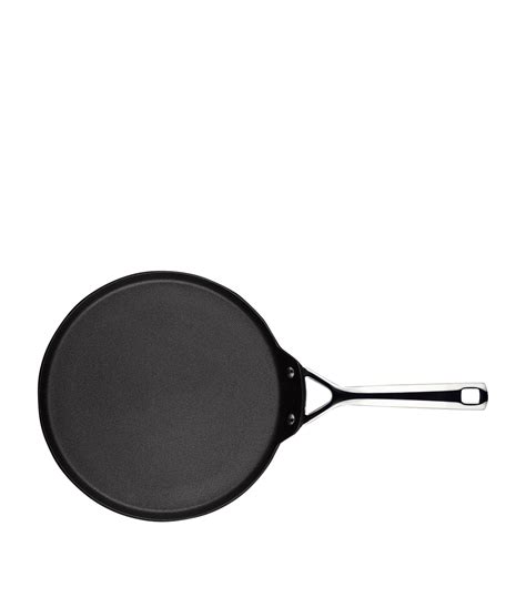 Le Creuset black Crepe Pan (28cm) | Harrods UK