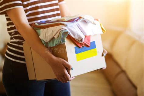 Volunteer Cyrrying Box with Humanitarian Aid for Ukrainian Refugees Stock Image - Image of ...