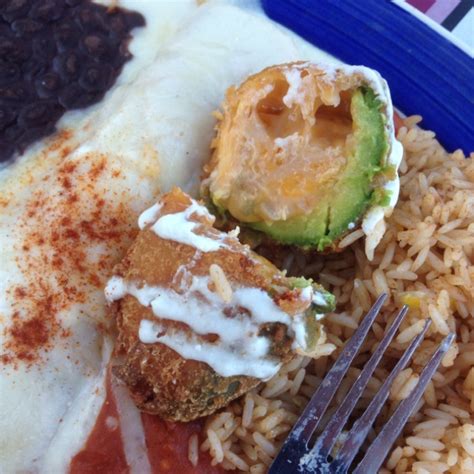 Haas avocado stuffed with cheese and chicken, tempura battered and deep ...