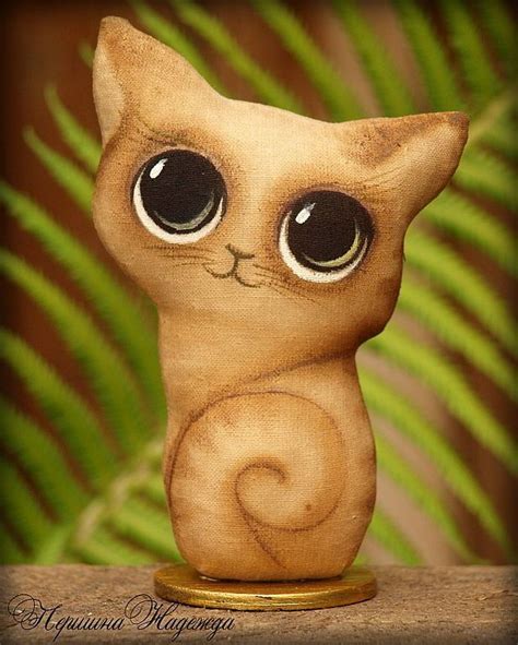 Игрушечные коты panosundaki Pin