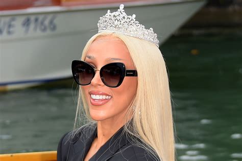 Doja Cat Is Daring in Plunging Coat, Pants & Heels for Dolce & Gabbana ...