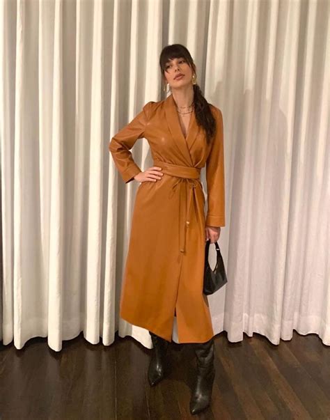 Camila Morrone Was Feeling Cute In Nanushka Vegan Leather Trench