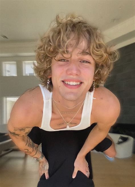 Future trends suggest a move toward the messy long hair guys aesthetic 1