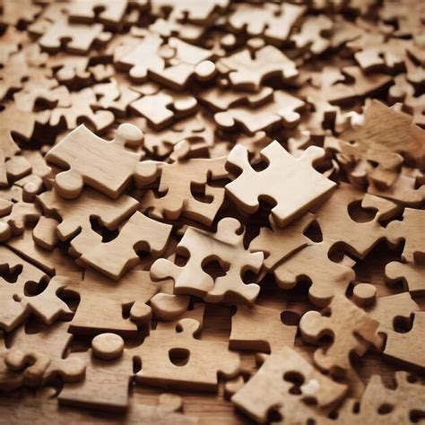 Premium AI Image | Jigsaw puzzle pieces on a table joint together
