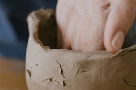 A Person Shaping a Clay · Free Stock Photo