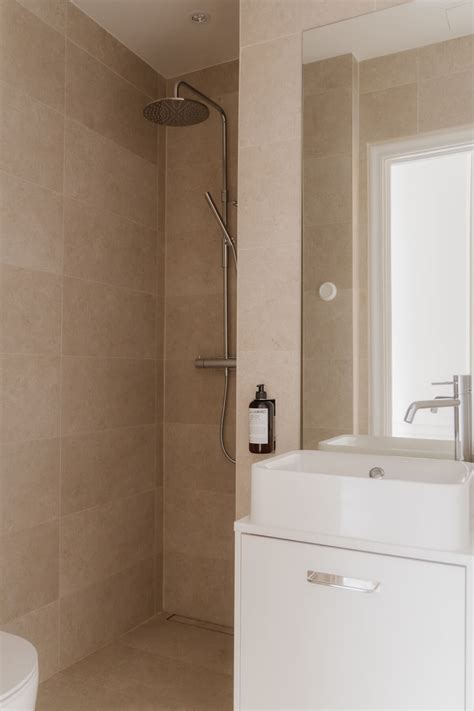 A Small Beige Apartment with Niches and Built-in Storage - The Nordroom