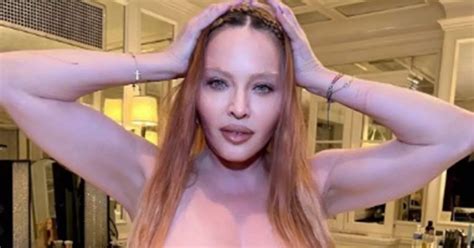 Madonna shocks fans as she goes completely topless in raciest snaps to ...