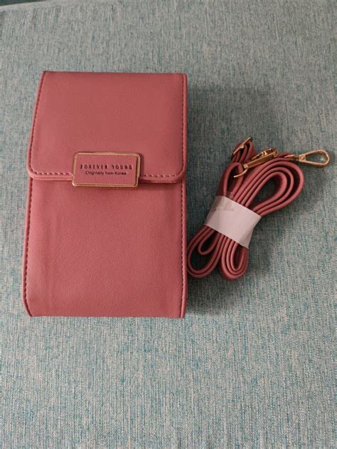 Forever Young Sling Bag (New), Luxury, Bags & Wallets on Carousell