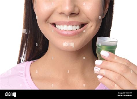 woman  oral rinse  white background closeup dental hygiene