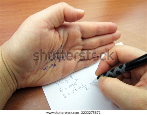 student cheats  exam cheat sheet stock photo