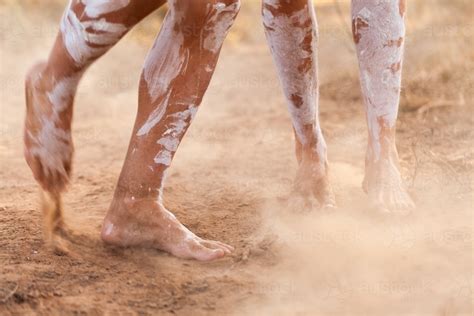 Image of Feet of First nations people dancing in oka paint to tell the ...