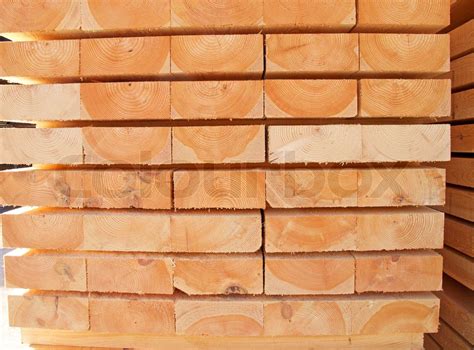 Stack of new wooden studs at the lumber yard | Stock image | Colourbox