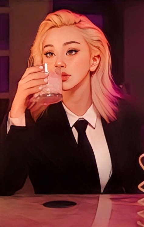 a woman sitting at a table with a drink in her hand and wearing a suit
