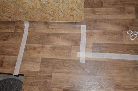 Laying industrial linoleum in the interior of the house 3726282 Stock ...