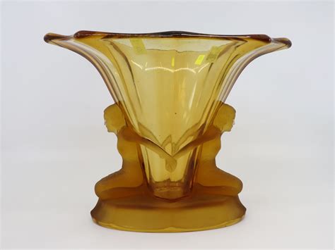 Lot - 1930S AMBER GLASS FIGURAL VASE WITH NUDE LADIES
