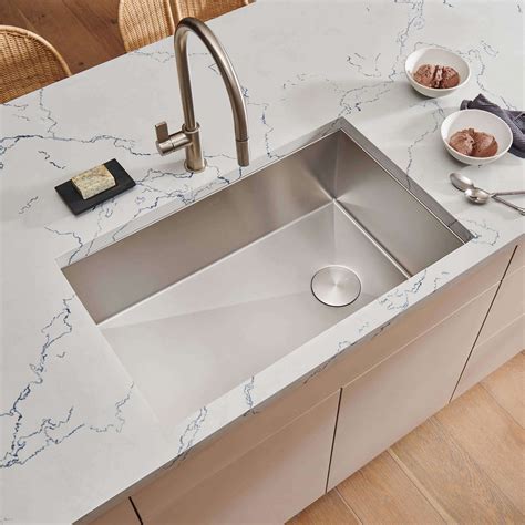 Ruvati 32-inch Slope Bottom Offset Drain Reversible Kitchen Sink
