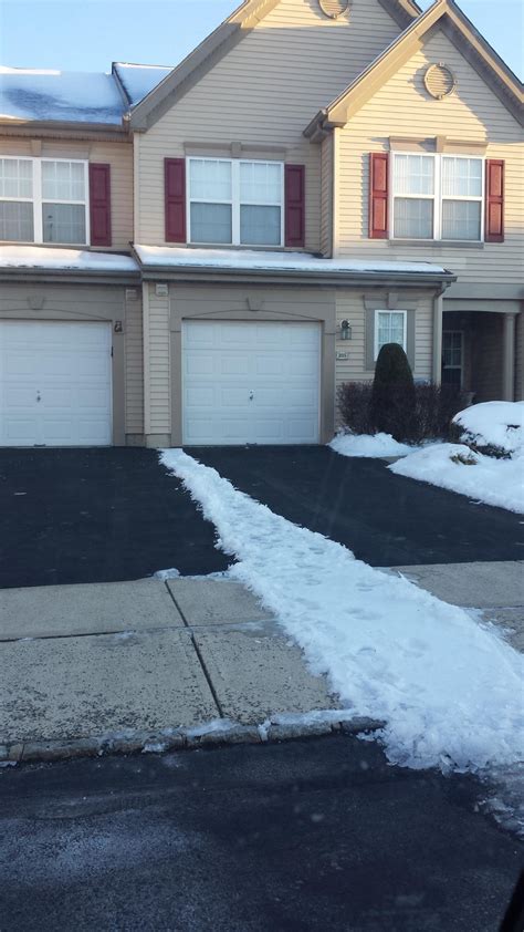 two neighbors to lazy to shovel middle of shared driveway : r