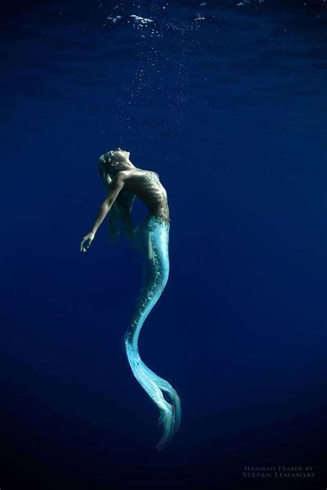 This woman is a professional mermaid and the pics are INCREDIBLE ...