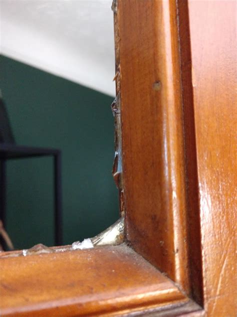 Fixing broken window. Not sure where the molding ends and door beings