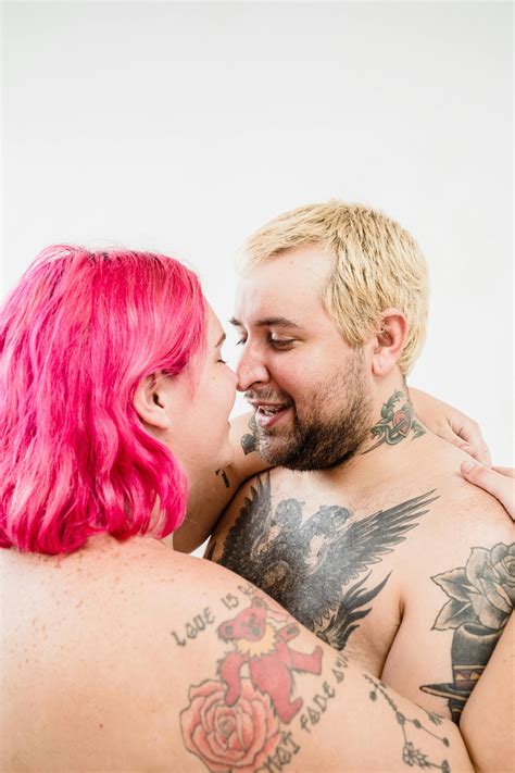Naked Eccentric Couple with Tattoos Kissing · Free Stock Photo