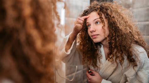 Acne Vs. Folliculitis: The Differences, Explained