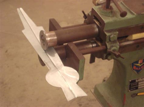 moyens de productions, machines : rouleuse à tôle, voluteuse, bordeuse ...