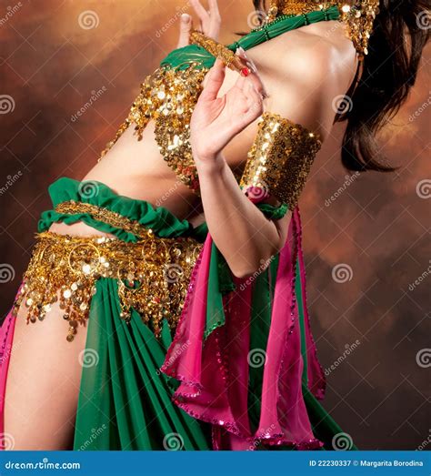 Exotic Belly Dancer In Blue And Gold Costume Royalty-Free Stock