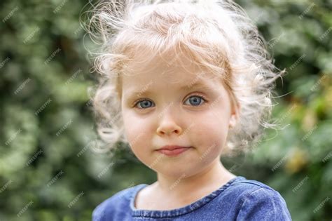 Baby Girl With Blue Eyes And Blonde Hair