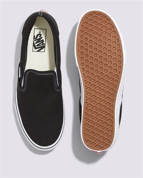 Shop Vans Classic Slip-On in Black