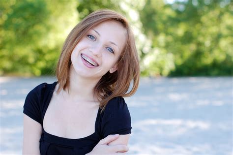 Charming girl wearing braces with a beautiful candid smile - Dudley