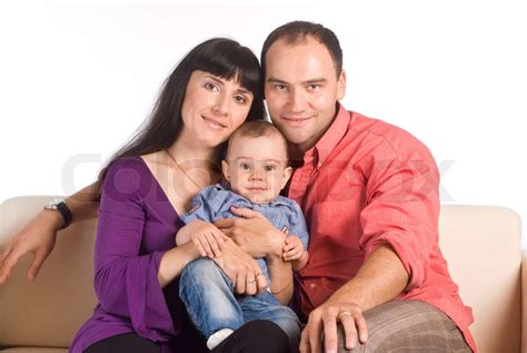 sød familie på sofa | Stock foto | Colourbox