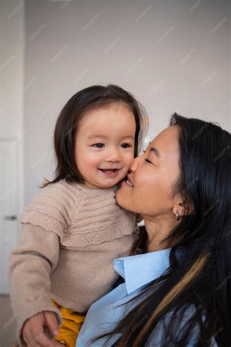 Free Photo | Asian mother and daughter spending time together at home