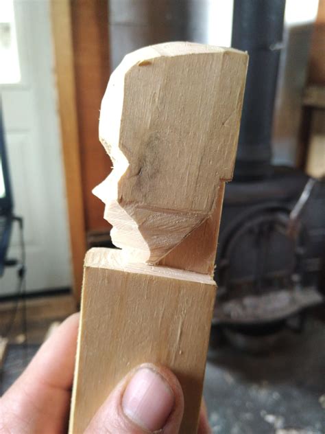 Trying to carve a face a day, here's how I rough out the basic features ...