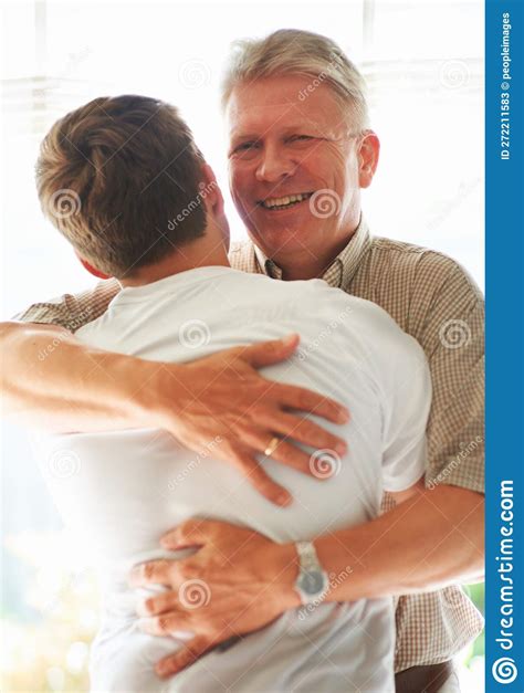 He Cherishes Visits from His Grandson. a Senior Man Embracing His