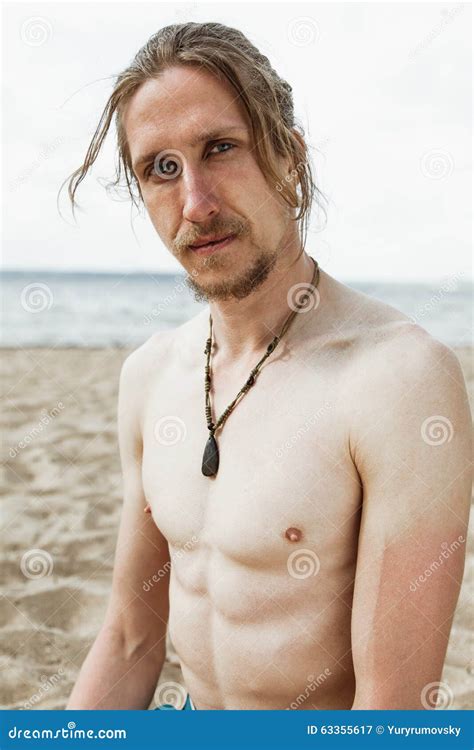 Portrait Hippie Man on the Beach Stock Image - Image of face, portrait 